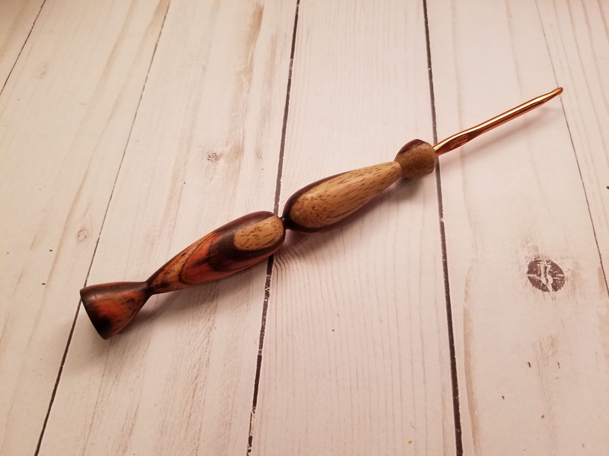 Custom hand turned crochet hook.