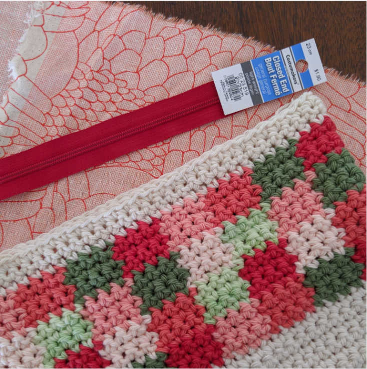 Picnic Clutch free crochet pattern by Sincerely, Pam using Bernat Handicrafter yarn.